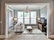 Sitting room showcasing a cozy white couch, neutral decor, and bright natural light at 1180 John Collier Rd, Atlanta, GA 30318