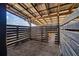 This horse stall features wood plank construction and a metal roof at 1570 Butler Bridge Rd, Covington, GA 30016