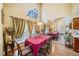 Elegant dining room featuring a mirrored wall, creating an airy feel, and beautiful decor for memorable gatherings at 1675 Paddlewheel Dr, Marietta, GA 30062