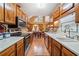 Open kitchen showcases stainless steel appliances, and bright white countertops, with an adjacent dining area at 1675 Paddlewheel Dr, Marietta, GA 30062