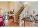 Open concept living room with staircase and view of the kitchen and dining area at 1675 Paddlewheel Dr, Marietta, GA 30062