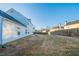 View of a fenced backyard and exterior of home at 2397 Shady Maple Trl, Loganville, GA 30052