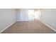 The bedroom has carpeted floors, a window, and double door closet at 2397 Shady Maple Trl, Loganville, GA 30052