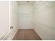 The walk-in closet has wire shelving, and carpeted floors at 2397 Shady Maple Trl, Loganville, GA 30052