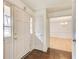 Welcoming foyer features hardwood floors and view to the dining room at 2658 Stonehenge Ct, Dunwoody, GA 30360