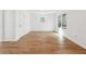 Bright bedroom featuring wood floors, a window with natural light, and a white interior door at 438 Ansley St, Decatur, GA 30030