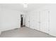 This is a bright bedroom with carpet flooring and a closet at 438 Ansley St, Decatur, GA 30030