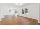 Spacious living room featuring pristine hardwood floors and large windows at 438 Ansley St, Decatur, GA 30030