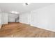 Spacious living room featuring hardwood floors and a staircase at 438 Ansley St, Decatur, GA 30030