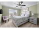 Charming bedroom featuring soft lighting and a decorative ceiling fan at 2560 Millwater Xing, Dacula, GA 30019