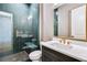 Stylish bathroom with glass-enclosed shower, modern fixtures, and tile flooring at 3927 Enclave Way, Tucker, GA 30084