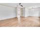 A bedroom with light hardwood floors, a ceiling fan, and neutral-toned walls at 3927 Enclave Way, Tucker, GA 30084