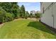 Expansive, well-manicured backyard offers a serene and private outdoor space at 4524 Mikajack Se Dr, Smyrna, GA 30080