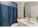 Bathroom with a shower and a sink, as well as a vanity and a large mirror at 4524 Mikajack Se Dr, Smyrna, GA 30080