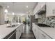Bright eat-in kitchen with stainless steel appliances and a large island at 4524 Mikajack Se Dr, Smyrna, GA 30080