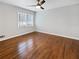 A comfortable bedroom featuring a ceiling fan and natural light at 6390 E Stubbs Rd, Atlanta, GA 30349