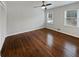 Bright bedroom with hardwood floors and natural light from two windows at 6390 E Stubbs Rd, Atlanta, GA 30349