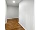An interior hallway with hardwood floors at 6390 E Stubbs Rd, Atlanta, GA 30349