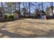 A spacious backyard featuring a storage shed and playground set at 2167 Tully Wren Ne, Marietta, GA 30066