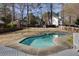 Backyard swimming pool surrounded by a concrete deck and expansive yard space at 2167 Tully Wren Ne, Marietta, GA 30066