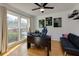 Inviting home office with a large window, a modern desk and chair, and sleek hardwood floors at 2167 Tully Wren Ne, Marietta, GA 30066