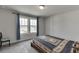 Bedroom with ample natural light, simple decor, and comfortable carpet at 3410 Summerpoint Xing, Cumming, GA 30028