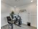 Well-lit home office featuring wainscoting, recessed lights, and modern gray flooring at 3410 Summerpoint Xing, Cumming, GA 30028