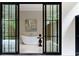 Bathroom features a freestanding tub and glass doors leading to the outside, creating a spa-like experience at 42 Blackland Nw Rd, Atlanta, GA 30342