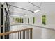 Expansive garage with an epoxy floor, multiple windows for natural light, and an automatic door opener at 42 Blackland Nw Rd, Atlanta, GA 30342