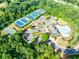 Aerial view of community amenities including tennis courts, playground, and pool at 6690 Bridge Brook Ovlk, Cumming, GA 30028