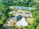 Community aerial view of amenities including tennis courts, playground, and pool at 6690 Bridge Brook Ovlk, Cumming, GA 30028