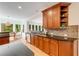 A bright eat-in kitchen with stainless steel appliances and wooden cabinets and countertops at 6690 Bridge Brook Ovlk, Cumming, GA 30028