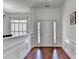 Bright and airy foyer features hardwood floors and elegant trim, creating a welcoming entrance at 337 Inverness Ave, Mcdonough, GA 30253
