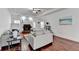 Comfortable living area with hardwood floors, fireplace, and ample natural light for relaxing at 337 Inverness Ave, Mcdonough, GA 30253