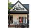 Boutique storefront with elegant signage and decorative iron accents at 3117 Moor View Rd # 36, Duluth, GA 30096