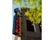 Playful restaurant exterior featuring a neon sign and brick building at 3117 Moor View Rd # 36, Duluth, GA 30096
