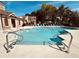 Community pool featuring clear blue water and lounge seating on a sunny day at 3117 Moor View Rd # 36, Duluth, GA 30096