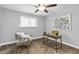 Bedroom with natural light and a cozy sitting area, perfect for relaxation or study at 343 8Th Ne St # G2, Atlanta, GA 30309