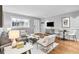 Inviting living room with hardwood floors, modern decor, and neutral color palette at 343 8Th Ne St # G2, Atlanta, GA 30309