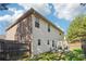 Exterior side view of the property featuring a fenced backyard and patio area at 248 Allegrini Dr, Atlanta, GA 30349