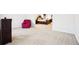 Spacious bedroom featuring neutral carpeting and a glimpse into another bedroom at 248 Allegrini Dr, Atlanta, GA 30349