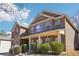 Charming two-story brick home with a covered front porch and well-maintained landscaping in a friendly neighborhood at 248 Allegrini Dr, Atlanta, GA 30349