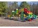 Colorful community playground featuring slides, climbing walls, and play structures for hours of outdoor fun at 248 Allegrini Dr, Atlanta, GA 30349