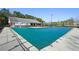 Community pool area with a pool cover; great for recreation and relaxation at 248 Allegrini Dr, Atlanta, GA 30349