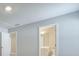 The bathroom is viewed through a doorway at 58 Cherry St, Lawrenceville, GA 30046
