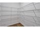 Spacious walk-in closet with ample shelving for storage and organization at 58 Cherry St, Lawrenceville, GA 30046