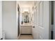 Cozy bathroom featuring a shower, mirrored vanity, and stylish hexagonal tile flooring at 104 Terrace Dr # 6, Atlanta, GA 30305