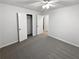 Neutral bedroom with carpet, ceiling fan and closet at 1487 Arnold Dr, Lawrenceville, GA 30043