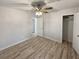 Bedroom featuring hardwood floors, ceiling fan and closet at 1487 Arnold Dr, Lawrenceville, GA 30043