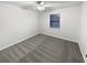 Neutral bedroom with carpet, ceiling fan and window at 1487 Arnold Dr, Lawrenceville, GA 30043